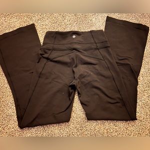 Lululemon black straight leg/flare leggings, size 6